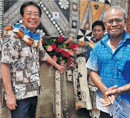  ??  ?? Embassy of Japan Chargés d’affaires ad interim Hada Tsuguyoshi (left), with Ratu Apenisa Maiyale during the commission­ing of the new water system at Nakorovou Village in Serua.