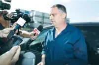  ?? (Flash90) ?? TV REPORTER Emmanuel Rosen speaks to media after he leaves a police station in Tel Aviv last year.