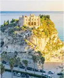  ?? ?? Tropea’s Santa Maria dell’Isola monastery is a popular draw come sunset