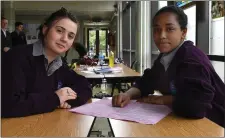  ??  ?? Tiffany O’Brien and Sahra Hassan analysing one of their exams at Coláiste Gleann Lí in Tralee last week.