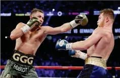  ?? ASSOCIATED PRESS ?? GENNADY GOLOVKIN (LEFT) FIGHTS CANELO ALVAREZ fight Saturday in Las Vegas. during a middleweig­ht title