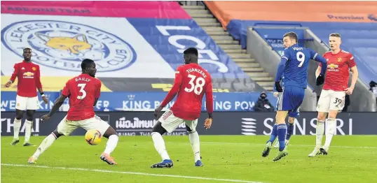  ?? PA/GETTY IMAGES ?? ALWAYS THERE: Jamie Vardy’s shot deflects off Axel Tuanzebe to draw City level for a second time. Below, Harvey Barnes tries to get away from United defender Eric Bailly, James Justins beats Bruno Fernandes to a header and, bottom, James Maddison in a tangle with Scott McTominay