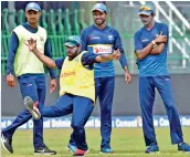  ?? — PTI ?? Sri Lankan players during a practice session in Colombo on Saturday ahead of the last ODI against India.