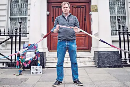  ??  ?? Richard Ratcliffe at the Iranian embassy in London yesterday, where he began a hunger strike in solidarity with his wife Nazanin, who is being held as a spy