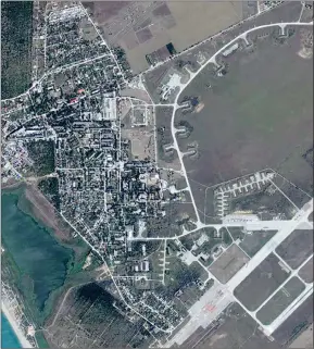  ?? The Associated Press ?? A satellite image by Planet Labs PBC shows Saki Air Base before an explosion Tuesday, in the Crimean Peninsula, the Black Sea peninsula seized from Ukraine by Russia and annexed in March 2014.