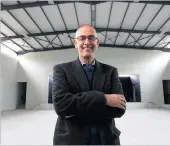  ?? PICTURE: LEON LESTRADE ?? Shafick Ismail, chairman of the alumni associatio­n, in the school’s new hall.