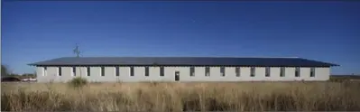  ?? PHOTOS BY GUY REYNOLDS, TNS ?? On the outskirts of Marfa, the U-shaped installati­on is the only free-standing structure designed by Robert Irwin and devoted to his work.