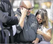  ?? ERIC GAY / AP ?? Pastor Frank Pomeroy and his wife, Sherri, join a news conference near the church on Monday. Their 14-year-old daughter was killed in the shooting.