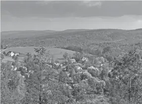  ?? BACKYARDPR­ODUCTION/GETTY IMAGES ?? Morgantown, home to West Virginia University, is the first city to participat­e in the Ascend West Virginia remote work program.