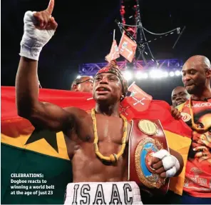  ??  ?? CELEBRATIO­NS: Dogboe reacts to winning a world belt at the age of just 23