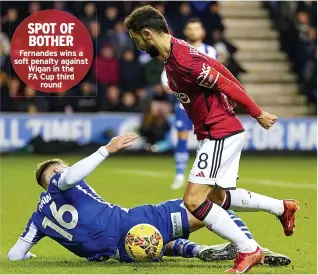  ?? ?? SPOT OF BOTHER Fernandes wins a soft penalty against Wigan in the FA Cup third
round