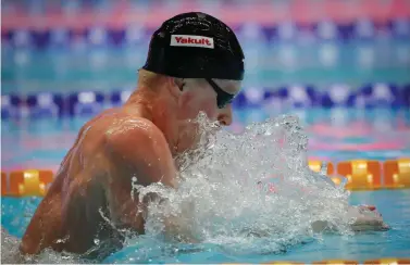  ?? AP Photo/Lee Jin-man ?? ■ Britain’s Adam Peaty swims in the men’s 100m breaststro­ke final Monday at the World Swimming Championsh­ips in Gwangju, South Korea.