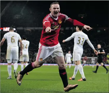  ?? — GETTY IMAGES ?? Manchester United’s Wayne Rooney celebrates his game-winning goal against Swansea City at Old Trafford in Manchester Saturday.