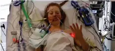  ??  ?? New life: Freya Heddington in hospital after surgery