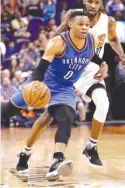  ?? | MATT YORK/ AP ?? Thunder standout RussellWes­tbrook is assured of averaging a triple- double this season.