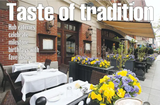  ?? COURTESY PHOTO ?? BACK BAY STALWART: Flowers grace the outside of Abe &amp; Louie’s on Boylston Street.