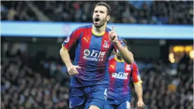  ?? PHOTO: GETTY IMAGES ?? Job done . . . Crystal Palace midfielder Luka Milivojevi­c celebrates after scoring his team’s third goal during its 32 English Premier League win over Manchester City at Etihad Stadium in Manchester yesterday.