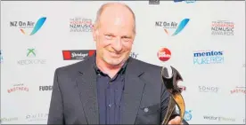  ?? PICTURE / GETTY IMAGES ?? Michael Houstoun with the award for best classical album during the New Zealand Music Awards in 2013, is performing in Whanganui on Friday.