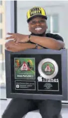  ?? ?? Skerrit Bwoy displays his award.