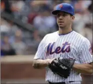  ?? FRANK FRANKLIN II — ASSOCIATED PRESS ?? Tommy Milone exits game during sixth inning of the Mets’ loss to Giants. In his New York debut, Milone allowed two runs over five innings.