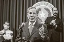  ?? Ricardo B. Brazziell / Austin American-statesman ?? Gov. Greg Abbott announced new business reopenings for Texas in his first statewide briefing on the pandemic in months.