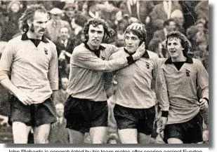  ?? ?? John Richards is congratula­ted by his team mates after scoring against Everton