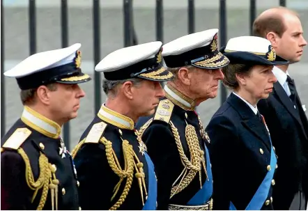  ?? AP ?? Members of the British royal family follow the coffin of the Queen Mother en route to her funeral in Westminste­r Abbey in London in 2002. Prince Andrew, left, Prince Charles, Prince Philip, Princess Anne and Prince Edward.