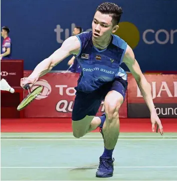  ??  ?? Battle royale: malaysia’s Lee Zii Jia staved off singapore’s Loh Kean yew before prevailing 19-21, 21-18, 21-12 in the first round of the Fuzhou China open yesterday.