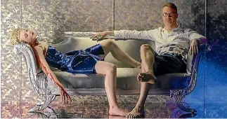  ??  ?? The Neon Demon director Nicolas Winding Refn, pictured with star Elle Fanning, says he wanted to make a film that looked at the world’s growing obsession with beauty.