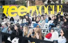  ?? Gina Ferazzi Los Angeles Times ?? ATTENDEES at the initial Teen Vogue Summit listen at an outdoor workshop.