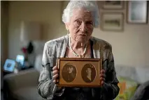  ?? PHOTO: TNS ?? Holocaust survivor Judy Meisel holds a photo of her parents Osser Beker (father) and Mika Beker (mother) that was taken around 1938.