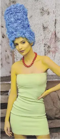  ?? MIKE COPPOLA/GETTY IMAGES ?? Emily Ratajkowsk­i was Marge Simpson at one of Heidi Klum’s famous Halloween parties.