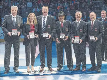  ?? RICK MADONIK TORONTO STAR ?? Alexander Yakushev, left, Jayna Hefford, Martin Brodeur, Willie O’Ree, Martin St. Louis and Gary Bettman were officially inducted in the Hockey Hall of Fame on Monday night.