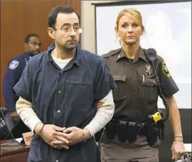  ?? Dale G. Young Detroit News ?? BIG CASES such as Larry Nassar, a former gymnastics doctor convicted of molesting athletes, have spurred a surge in patient complaints, experts say.