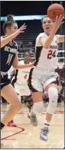  ?? (AP/Tony Avelar) ?? Guard Lacie Hull (24) looks to gain control of the ball Saturday in front of forward Sage Stobbart during the second half of No. 5 Stanford’s 67-55 victory over UC-Davis in Palo Alto, Calif.