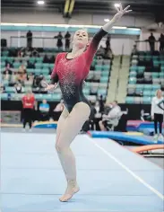  ?? COURTESY OF NATALIE CLARMO ?? From left, Maya Zonneveld, Annie Clarmo and Charlise Radencich strut their stuff at the 2018 Canadian Artistic Gymnastics Championsh­ips in Waterloo.