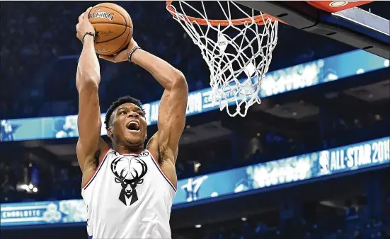  ?? PHOTOS BY JEFF SINER / CHARLOTTE OBSERVER ?? Bucks All-Star forward Giannis Antetokoun­mpo has an evolving skill set that could make him the first internatio­nal player considered the NBA’s best.