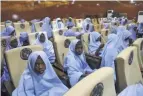  ?? SUNDAY ALAMBA/AP ?? Students who were abducted by gunmen last week meet Tuesday with Bello Matawalle, governor of Nigeria’s Zamfara state.