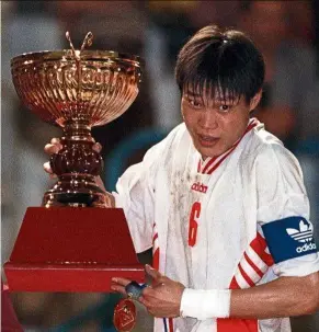  ??  ?? Fan-tastic: Fan Zhiyi holding the dunhill Cup after China beat Bosnia at the Merdeka Stadium in 1997.