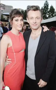  ??  ?? Lizzy Caplan and Michael Sheen portray Virginia Johnson and William Masters, the sex researcher­s of the mid-20th century.