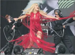  ?? PICTURE: YUI MOK/PA WIRE ?? ON SONG: Singer Rita Ora is a big fan of Asos, which saw sales rise 32 per cent to £676m.