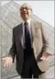  ?? PIERRE GLEIZES — AP FILE ?? In this file photo, ChineseAme­rican architect I.M. Pei laughs while posing for a portrait in front of the Louvre glass pyramid, which he designed, in the museum’s Napoleon Courtyard, prior to its inaugurati­on in Paris.