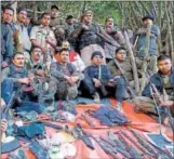  ?? HT ?? Police with weapons seized from poachers in Kaziranga.