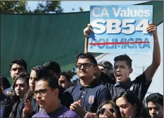  ?? MEL MELCON/LOS ANGELES TIMES FILE PHOTOGRAPH ?? Students at a 2017 rally in Highland Park in support of SB 54. A federal judge refused Thursday to block California from restrictin­g local law enforcemen­t cooperatio­n with immigratio­n agents, an early legal victory for the state’s “sanctuary” law.