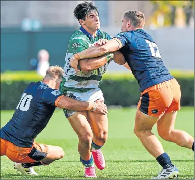  ?? ?? Benetton’s Lorenzo Cannone is brought to a halt by Jaco van der Walt and James Lang yesterday