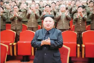  ?? KCNA VIA KNS/AFP ?? North Korean leader Kim Jong-un visits the People’s Theatre to mark the 70th anniversar­y of the founding of the State Merited Chorus in Pyongyang on Wednesday.
