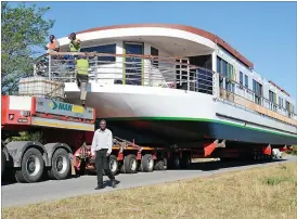  ??  ?? The African Dream house boat enroute to Botswana from Harare