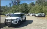  ?? ALAN DEP — MARIN INDEPENDEN­T
JOURNAL ?? Marin sheriff vehicles gather at the Bear Valley Visitor Center during the Woodward Fire in Olema in August.