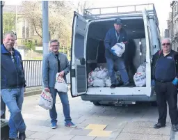  ??  ?? Members of Veterans In Communitie­s and Councillor Sean Serridge on the food distributi­on trail for Positive Start.