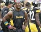  ?? FRED VUICH — THE ASSOCIATED PRESS FILE ?? In this file photo, Pittsburgh Steelers linebacker James Harrison walks the sidelines as his team plays against the Jacksonvil­le Jaguars in an NFL football game in Pittsburgh. The New England Patriots signed Harrison, Tuesday after he was released on...